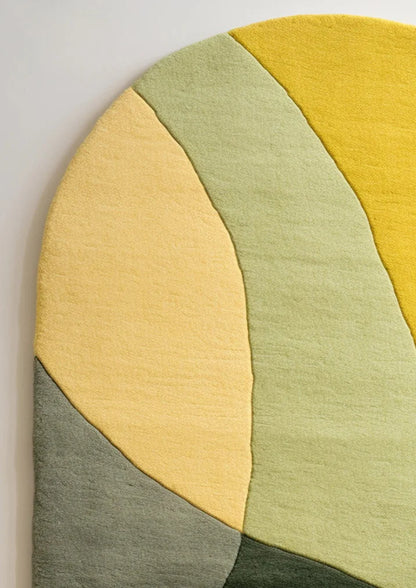Green & yellow irregular hand tufted carpet & rug
