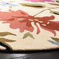 Surma Floral Round Hand Tufted Rug